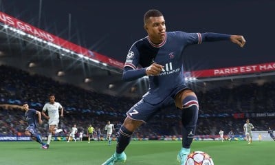 Kylian Mbappe dribbling the ball in the Parc de Princes.