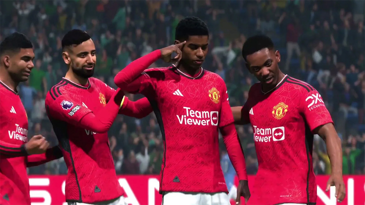 Marcus Rashford doing his celebration, with Anthony Martial, Bruno Fernandes, and Casemiro standing beside him.