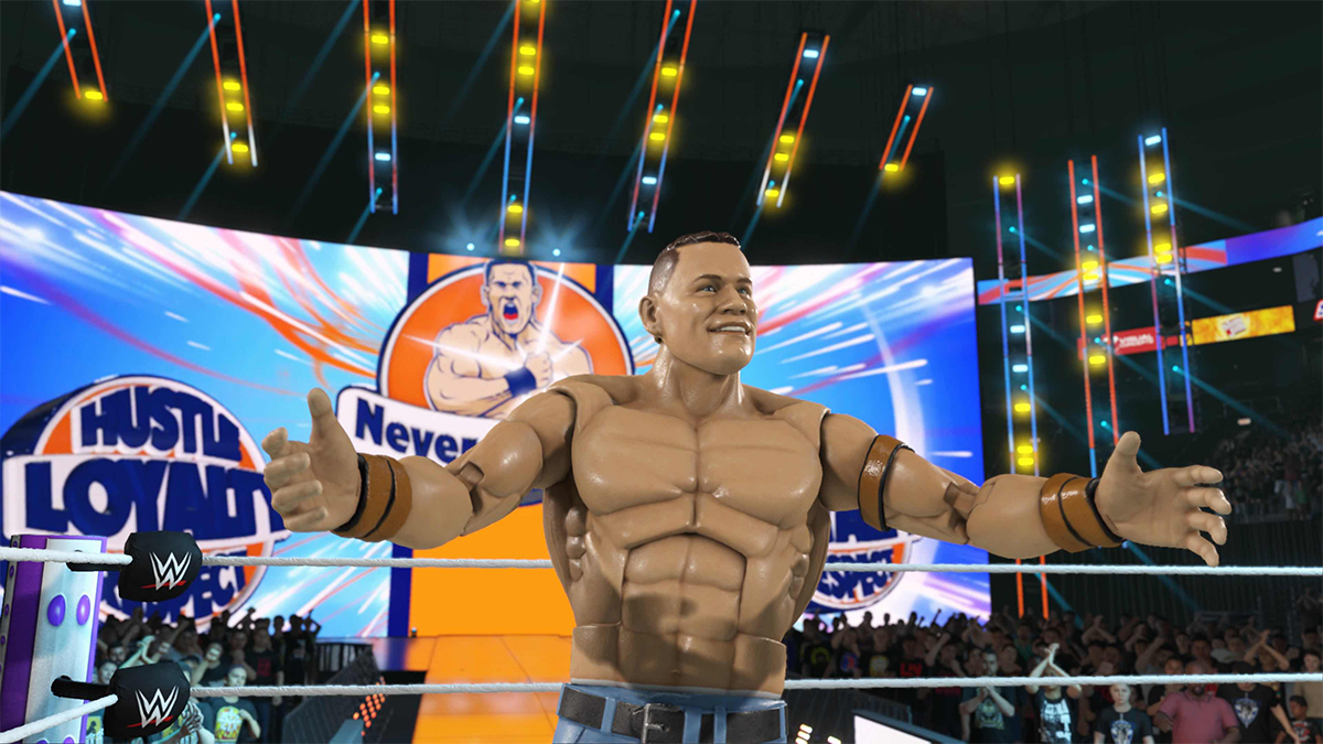 Elite Mattel John Cena doing his entrance, standing in front of his titantron with his arms spread out.