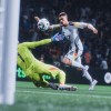 EA FC key art showing a player lobbing the Goalkeeper